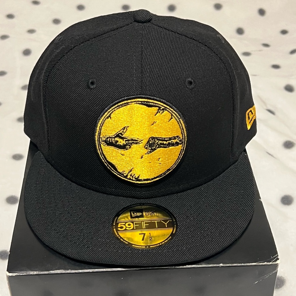 New Era Black Cap with Gold Emblem